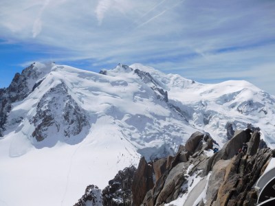 Majestic Mont Blanc with climbers in the foreground just finishing the Cosmiques Arête